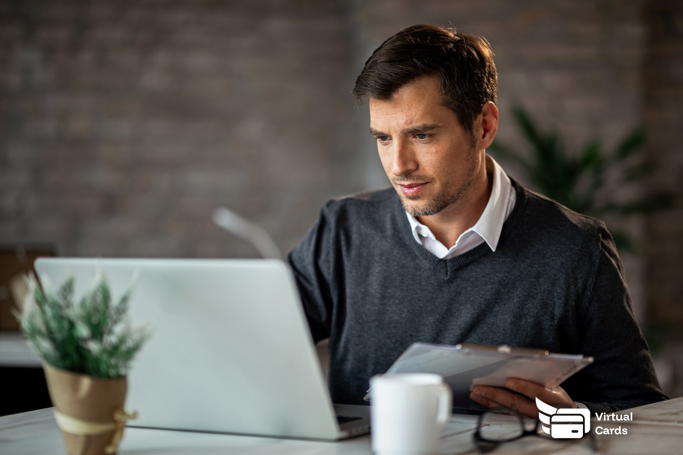 Finance director reviewing employee expense cards on a dashboard instead of paper expense reports
