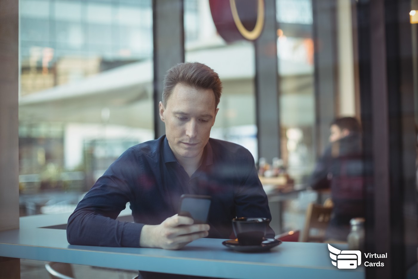 Business owner reviewing per diem card charges on a dashboard while a sales rep travels